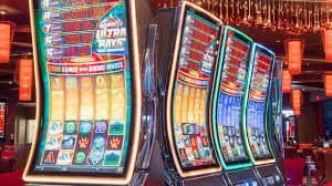 winph22 slot game reels spinning on a mobile phone screen